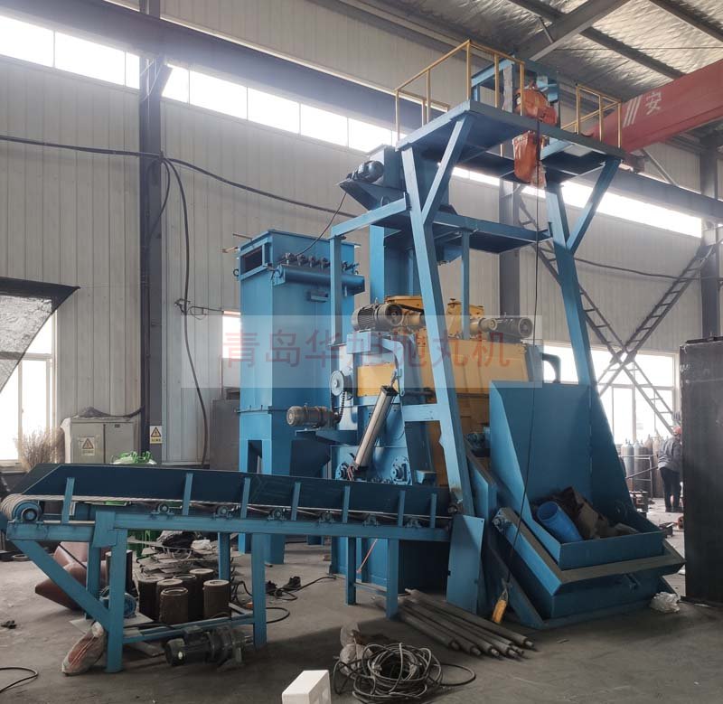 Q3220自動上下料履帶式拋丸機調(diào)試完畢