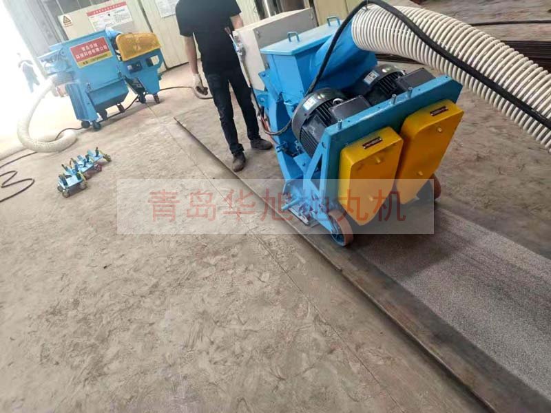 移動(dòng)式拋丸機(jī)清理鋼板表面鐵銹